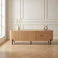 Meuble TV Anatole en chêne clair 180 cm, deux portes et deux tiroirs sur pieds fins en métal noir