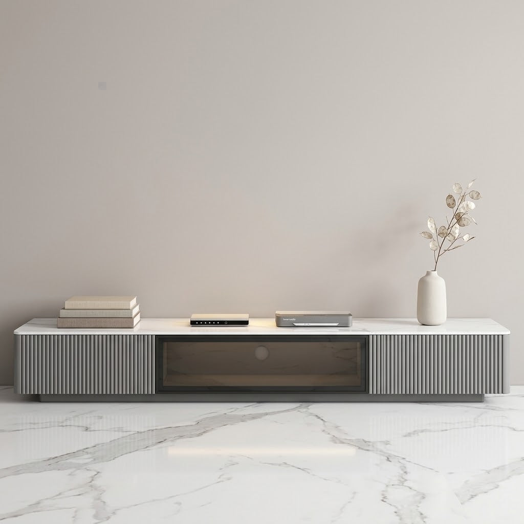 Meuble TV Éléonore gris graphite à façade cannelée et plateau effet marbre, niche centrale vitrée